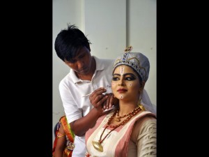 The traditional costume and make up of Sutradhar or narrator in Sattriya dance drama
