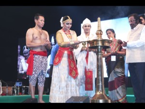 Krishnakshi lighting of the lamp in BHARATHEEYAM 2014 with Guru Ramkrishna Talukdar and in presence of noted singer Yesudas